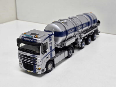 Scale-model tanker truck in silver and blue with Berkhof branding, shown from a low front-left angle with multiple connected trailers against a white background.